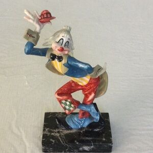 Whimsical Clown Sculpture in Red, Blue, and  Yellow. *